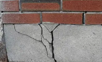 Concrete foundation with serious structural damage in {city}, {state}